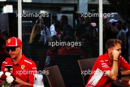(L to R): Kimi Raikkonen (FIN) Ferrari with team mate Sebastian Vettel (GER) Ferrari. 27.09.2018. Formula 1 World Championship, Rd 16, Russian Grand Prix, Sochi Autodrom, Sochi, Russia, Preparation Day.