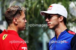 (L to R): Sebastian Vettel (GER) Ferrari with Pierre Gasly (FRA) Scuderia Toro Rosso. 27.09.2018. Formula 1 World Championship, Rd 16, Russian Grand Prix, Sochi Autodrom, Sochi, Russia, Preparation Day.