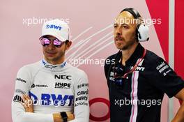 (L to R): Esteban Ocon (FRA) Racing Point Force India F1 Team with Dan Williams (GBR) Racing Point Force India F1 Personal Trainer. 14.09.2018. Formula 1 World Championship, Rd 15, Singapore Grand Prix, Marina Bay Street Circuit, Singapore, Practice Day.