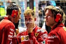 Sebastian Vettel (GER) Ferrari on the grid. 16.09.2018. Formula 1 World Championship, Rd 15, Singapore Grand Prix, Marina Bay Street Circuit, Singapore, Race Day.