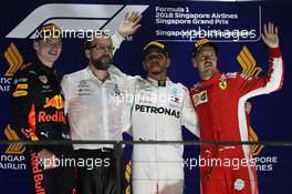 1st place Lewis Hamilton (GBR) Mercedes AMG F1 W09, 2nd place Max Verstappen (NLD) Red Bull Racing RB14 and 3rd place Sebastian Vettel (GER) Ferrari SF71H. 16.09.2018. Formula 1 World Championship, Rd 15, Singapore Grand Prix, Marina Bay Street Circuit, Singapore, Race Day.