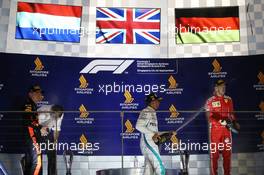 1st place Lewis Hamilton (GBR) Mercedes AMG F1 W09, 2nd place Max Verstappen (NLD) Red Bull Racing RB14 and 3rd place Sebastian Vettel (GER) Ferrari SF71H. 16.09.2018. Formula 1 World Championship, Rd 15, Singapore Grand Prix, Marina Bay Street Circuit, Singapore, Race Day.