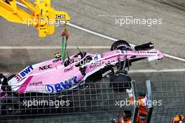 The Racing Point Force India F1 VJM11 of Esteban Ocon (FRA) Racing Point Force India F1 Team is craned from the circuit. 16.09.2018. Formula 1 World Championship, Rd 15, Singapore Grand Prix, Marina Bay Street Circuit, Singapore, Race Day.