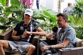 Esteban Ocon (FRA) Racing Point Force India F1 Team with Will Buxton (GBR) F1 Digital Presenter. 15.09.2018. Formula 1 World Championship, Rd 15, Singapore Grand Prix, Marina Bay Street Circuit, Singapore, Qualifying Day.
