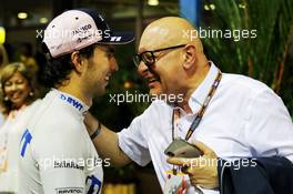 Sergio Perez (MEX) Racing Point Force India F1 Team with Andreas Weissenbacher, BWT Chief Executive Officer. 15.09.2018. Formula 1 World Championship, Rd 15, Singapore Grand Prix, Marina Bay Street Circuit, Singapore, Qualifying Day.