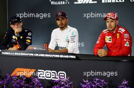 Qualifying top three in the FIA Press Conference (L to R): Max Verstappen (NLD) Red Bull Racing, second; Lewis Hamilton (GBR) Mercedes AMG F1, pole position; Sebastian Vettel (GER) Ferrari, third 15.09.2018. Formula 1 World Championship, Rd 15, Singapore Grand Prix, Marina Bay Street Circuit, Singapore, Qualifying Day.