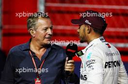 Lewis Hamilton (GBR) Mercedes AMG F1 in qualifying parc ferme with Martin Brundle (GBR) Sky Sports Commentator. 15.09.2018. Formula 1 World Championship, Rd 15, Singapore Grand Prix, Marina Bay Street Circuit, Singapore, Qualifying Day.