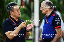 (L to R): Toyoharu Tanabe (JPN) Honda F1 Technical Director with Franz Tost (AUT) Scuderia Toro Rosso Team Principal. 13.09.2018. Formula 1 World Championship, Rd 15, Singapore Grand Prix, Marina Bay Street Circuit, Singapore, Preparation Day.