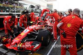 Sebastian Vettel (GER) Ferrari SF71H on the grid. 25.11.2018. Formula 1 World Championship, Rd 21, Abu Dhabi Grand Prix, Yas Marina Circuit, Abu Dhabi, Race Day.