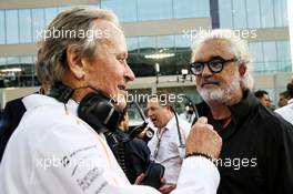 (L to R): Mansour Ojjeh, McLaren shareholder with Flavio Briatore (ITA) on the grid. 25.11.2018. Formula 1 World Championship, Rd 21, Abu Dhabi Grand Prix, Yas Marina Circuit, Abu Dhabi, Race Day.