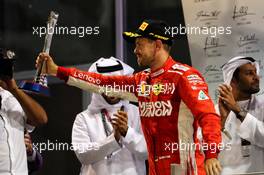 Sebastian Vettel (GER) Ferrari celebrates his second position on the podium. 25.11.2018. Formula 1 World Championship, Rd 21, Abu Dhabi Grand Prix, Yas Marina Circuit, Abu Dhabi, Race Day.