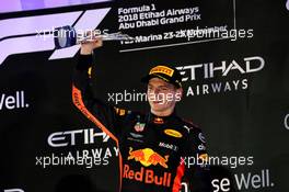 Max Verstappen (NLD) Red Bull Racing celebrates his third position on the podium. 25.11.2018. Formula 1 World Championship, Rd 21, Abu Dhabi Grand Prix, Yas Marina Circuit, Abu Dhabi, Race Day.