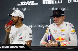 (L to R): Lewis Hamilton (GBR) Mercedes AMG F1 and Max Verstappen (NLD) Red Bull Racing in the post race FIA Press Conference. 25.11.2018. Formula 1 World Championship, Rd 21, Abu Dhabi Grand Prix, Yas Marina Circuit, Abu Dhabi, Race Day.