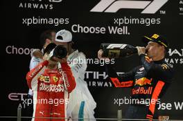 1st place Lewis Hamilton (GBR) Mercedes AMG F1 W09, 2nd place Sebastian Vettel (GER) Ferrari SF71H and 3rd place Max Verstappen (NLD) Red Bull Racing RB14. 25.11.2018. Formula 1 World Championship, Rd 21, Abu Dhabi Grand Prix, Yas Marina Circuit, Abu Dhabi, Race Day.