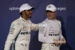 Lewis Hamilton (GBR) Mercedes AMG F1 W09 and Valtteri Bottas (FIN) Mercedes AMG F1. 24.11.2018. Formula 1 World Championship, Rd 21, Abu Dhabi Grand Prix, Yas Marina Circuit, Abu Dhabi, Qualifying Day.