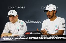 (L to R): Valtteri Bottas (FIN) Mercedes AMG F1 and Lewis Hamilton (GBR) Mercedes AMG F1 in the post qualifying FIA Press Conference. 24.11.2018. Formula 1 World Championship, Rd 21, Abu Dhabi Grand Prix, Yas Marina Circuit, Abu Dhabi, Qualifying Day.