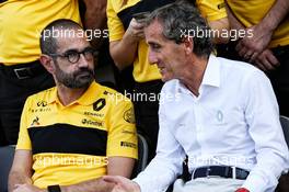 (L to R): Thierry Koskas, Renault Executive Vice President of Sales and Marketing and Alain Prost (FRA) Renault Sport F1 Team Special Advisor at a team photograph. 25.11.2018. Formula 1 World Championship, Rd 21, Abu Dhabi Grand Prix, Yas Marina Circuit, Abu Dhabi, Race Day.