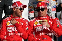 Sebastian Vettel (GER) Scuderia Ferrari and Kimi Raikkonen (FIN) Scuderia Ferrari  25.11.2018. Formula 1 World Championship, Rd 21, Abu Dhabi Grand Prix, Yas Marina Circuit, Abu Dhabi, Race Day.