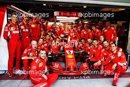 Sebastian Vettel (GER) Ferrari SF71H at a team photograph. 25.11.2018. Formula 1 World Championship, Rd 21, Abu Dhabi Grand Prix, Yas Marina Circuit, Abu Dhabi, Race Day.