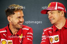(L to R): Sebastian Vettel (GER) Ferrari with Kimi Raikkonen (FIN) Ferrari in the FIA Press Conference. 22.11.2018. Formula 1 World Championship, Rd 21, Abu Dhabi Grand Prix, Yas Marina Circuit, Abu Dhabi, Preparation Day.