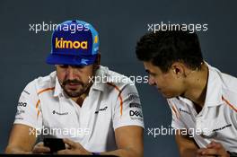 (L to R): Fernando Alonso (ESP) McLaren and Lando Norris (GBR) McLaren Test Driver in the FIA Press Conference. 22.11.2018. Formula 1 World Championship, Rd 21, Abu Dhabi Grand Prix, Yas Marina Circuit, Abu Dhabi, Preparation Day.