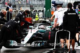 Lewis Hamilton (GBR) Mercedes AMG F1 W09 pushed back down the pit lane by mechanics. 19.10.2018. Formula 1 World Championship, Rd 18, United States Grand Prix, Austin, Texas, USA, Practice Day.