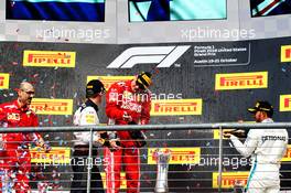 The podium (L to R): Max Verstappen (NLD) Red Bull Racing, second; Kimi Raikkonen (FIN) Ferrari, race winner; Lewis Hamilton (GBR) Mercedes AMG F1, third. 21.10.2018. Formula 1 World Championship, Rd 18, United States Grand Prix, Austin, Texas, USA, Race Day.