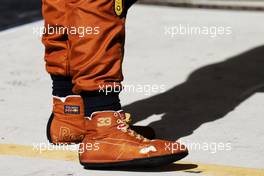 The worn racing boots of Max Verstappen (NLD) Red Bull Racing in parc ferme. 21.10.2018. Formula 1 World Championship, Rd 18, United States Grand Prix, Austin, Texas, USA, Race Day.