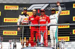 The podium (L to R): Max Verstappen (NLD) Red Bull Racing, second; Carlo Santi, Ferrari Race Engineer; Kimi Raikkonen (FIN) Ferrari, race winner; Lewis Hamilton (GBR) Mercedes AMG F1, third. 21.10.2018. Formula 1 World Championship, Rd 18, United States Grand Prix, Austin, Texas, USA, Race Day.