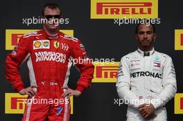 1st place Kimi Raikkonen (FIN) Ferrari SF71H and Lewis Hamilton (GBR) Mercedes AMG F1 W09. 21.10.2018. Formula 1 World Championship, Rd 18, United States Grand Prix, Austin, Texas, USA, Race Day.