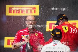 Carlo Santi, Ferrari Race Engineer celebrates on the podium with race winner Kimi Raikkonen (FIN) Ferrari and Lewis Hamilton (GBR) Mercedes AMG F1. 21.10.2018. Formula 1 World Championship, Rd 18, United States Grand Prix, Austin, Texas, USA, Race Day.
