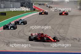 Kimi Raikkonen (FIN) Ferrari SF71H leads at the start of the race. 21.10.2018. Formula 1 World Championship, Rd 18, United States Grand Prix, Austin, Texas, USA, Race Day.