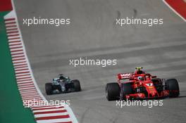 Kimi Raikkonen (FIN) Ferrari SF71H leads Lewis Hamilton (GBR) Mercedes AMG F1 W09. 21.10.2018. Formula 1 World Championship, Rd 18, United States Grand Prix, Austin, Texas, USA, Race Day.