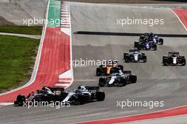 Kevin Magnussen (DEN) Haas VF-18 and Sergey Sirotkin (RUS) Williams FW41 at the start of the race. 21.10.2018. Formula 1 World Championship, Rd 18, United States Grand Prix, Austin, Texas, USA, Race Day.