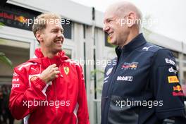 (L to R): Sebastian Vettel (GER) Ferrari with Adrian Newey (GBR) Red Bull Racing Chief Technical Officer. 20.10.2018. Formula 1 World Championship, Rd 18, United States Grand Prix, Austin, Texas, USA, Qualifying Day.