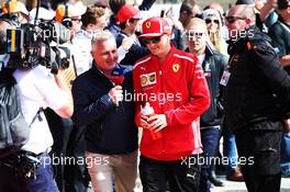 (L to R): Johnny Herbert (GBR) Sky Sports F1 Presenter with Kimi Raikkonen (FIN) Ferrari on the drivers parade. 21.10.2018. Formula 1 World Championship, Rd 18, United States Grand Prix, Austin, Texas, USA, Race Day.