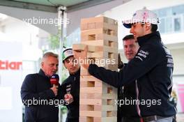 Sergio Perez (MEX) Racing Point Force India F1 Team and team mate Esteban Ocon (FRA) Racing Point Force India F1 Team play giant Jenga with Johnny Herbert (GBR) Sky Sports F1 Presenter and David Croft (GBR) Sky Sports Commentator. 18.10.2018. Formula 1 World Championship, Rd 18, United States Grand Prix, Austin, Texas, USA, Preparation Day.