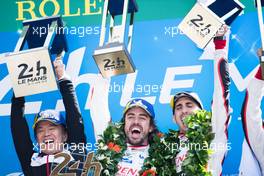 (L to R): Race winners Fernando Alonso (ESP) andSebastien Buemi (SUI) #08 Toyota Gazoo Racing, celebrate on the podium. 16-17.06.2018. FIA World Endurance Championship, Le Mans 24 Hours, Race, Le Mans, France.