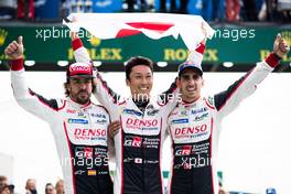 (L to R): Race winners Fernando Alonso (ESP); Kazuki Nakajima (JPN); and Sebastien Buemi (SUI) #08 Toyota Gazoo Racing, celebrate in parc ferme. 16-17.06.2018. FIA World Endurance Championship, Le Mans 24 Hours, Race, Le Mans, France.