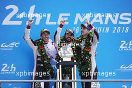 (L to R): Race winners Kazuki Nakajima (JPN); Fernando Alonso (ESP); and Sebastien Buemi (SUI) / #08 Toyota Gazoo Racing, celebrate on the podium. 16-17.06.2018. FIA World Endurance Championship, Le Mans 24 Hours, Race, Le Mans, France.
