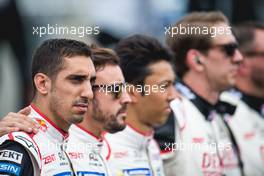(L to R): Sebastien Buemi (SUI); Fernando Alonso (ESP); and Kazuki Nakajima (JPN) #08 Toyota Gazoo Racing Toyota TS050 Hybrid on the grid.  16-17.06.2018. FIA World Endurance Championship, Le Mans 24 Hours, Race, Le Mans, France.