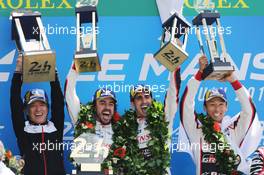 Race winners Fernando Alonso (ESP); Sebastien Buemi (SUI); and Kazuki Nakajima (JPN) #08 Toyota Gazoo Racing, celebrate on the podium. 16-17.06.2018. FIA World Endurance Championship, Le Mans 24 Hours, Race, Le Mans, France.