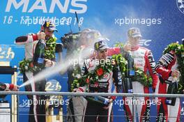 Race winner Sebastien Buemi (SUI) Toyota Gazoo Racing celebrates on the podium. 16-17.06.2018. FIA World Endurance Championship, Le Mans 24 Hours, Race, Le Mans, France.
