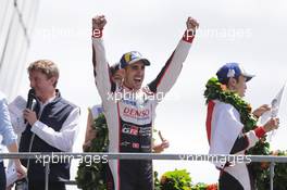 Race winner Sebastien Buemi (SUI) Toyota Gazoo Racing celebrates on the podium. 16-17.06.2018. FIA World Endurance Championship, Le Mans 24 Hours, Race, Le Mans, France.