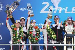 (L to R): Kamui Kobayashi (JPN); Mike Conway (GBR); and Jose Maria Lopez (ARG) #07 Toyota Gazoo Racing, celebrate second position on the podium. 16-17.06.2018. FIA World Endurance Championship, Le Mans 24 Hours, Race, Le Mans, France.