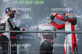 Jose Maria Lopez (ARG) Toyota Gazoo Racing (Left) celebrates his second position on the podium with third placed Andre Lotterer (GER) Rebellion Racing (Right).  05.05.2018. FIA World Endurance Championship, Round 1, Spa-Francorchamps, Belgium, Saturday.