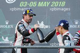 Race winner Fernando Alonso (ESP) Toyota Gazoo Racing celebrates on the podium with team mate Kazuki Nakajima (JPN). 05.05.2018. FIA World Endurance Championship, Round 1, Spa-Francorchamps, Belgium, Saturday.