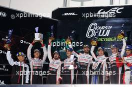 Toyota Gazoo Racing celebrate a 1-2 finish on the podium (L to R): Shigeki Tomoyama (JPN) President Gazoo Racing Company; Kazuki Nakajima (JPN); Fernando Alonso (ESP); Sebastien Buemi (SUI), second; Jose Maria Lopez (ARG); Kamui Kobayashi (JPN); Mike Conway (GBR), race winners. 14.10.2018. FIA World Endurance Championship, Round 4, Six Hours of Fuji, Fuji, Japan, Sunday.