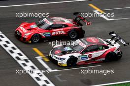 Ronnie Quintarelli (ITA) - Tsugio Matsuda (JPN) (NISMO/Nissan)  und Timo Glock (GER) (BMW Team RMR - BMW M4 DTM)   05.10.2019, DTM Round 9, Hockenheimring, Germany, Saturday.