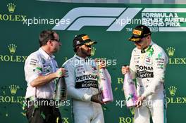 Race winner Valtteri Bottas (FIN) Mercedes AMG F1 celebrates on the podium with Lewis Hamilton (GBR) Mercedes AMG F1. 17.03.2019. Formula 1 World Championship, Rd 1, Australian Grand Prix, Albert Park, Melbourne, Australia, Race Day.